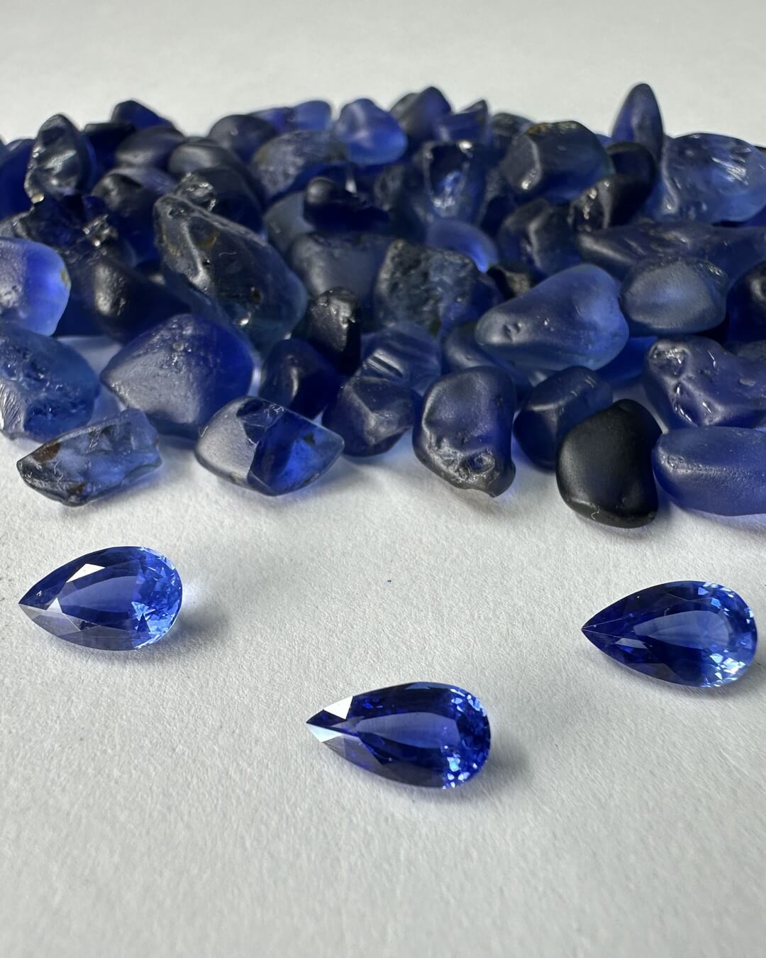 rough and cut blue sapphires
